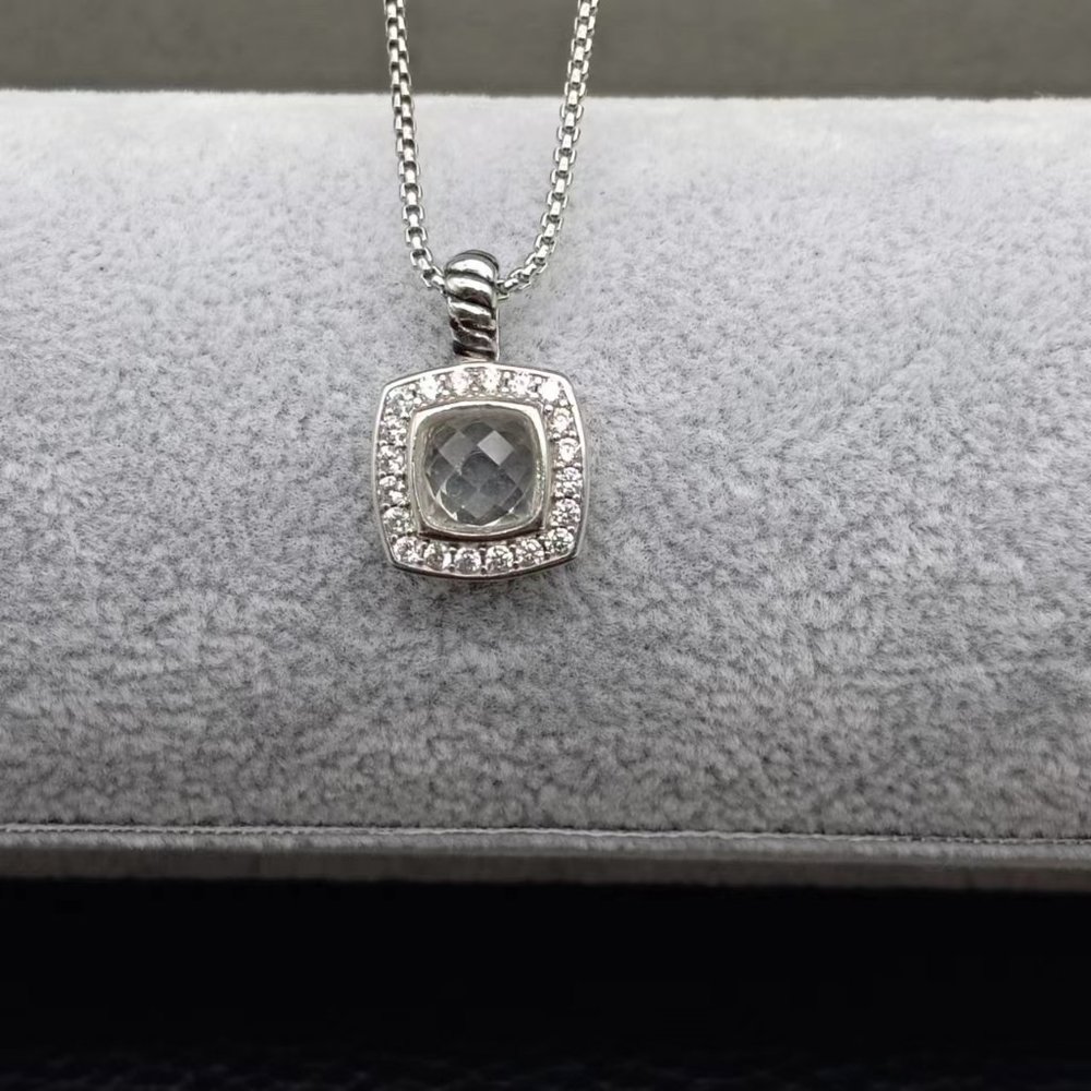 David Yurman sterling silver pendant necklacewithwhitetopaz and pavementdiamonds